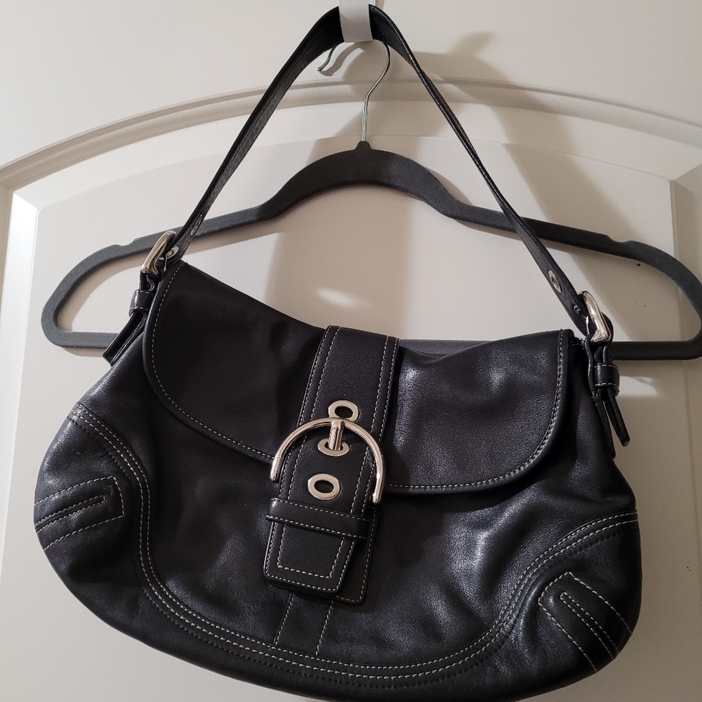 Coach handbag with buckle